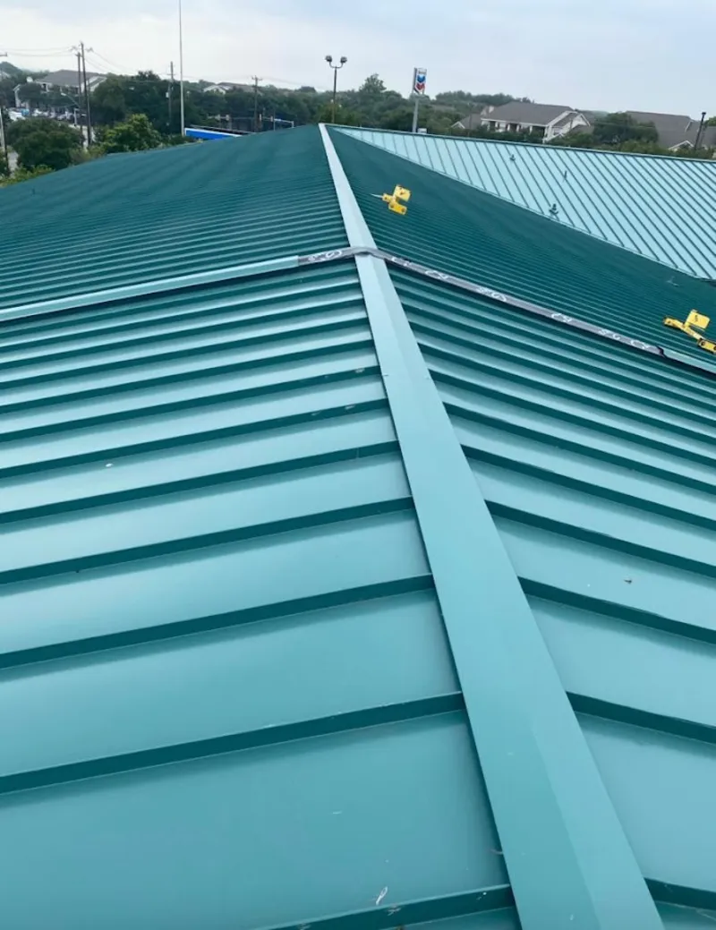 Green commercial metal roof ridge and valley for Metal Roof Repair in Highland Village